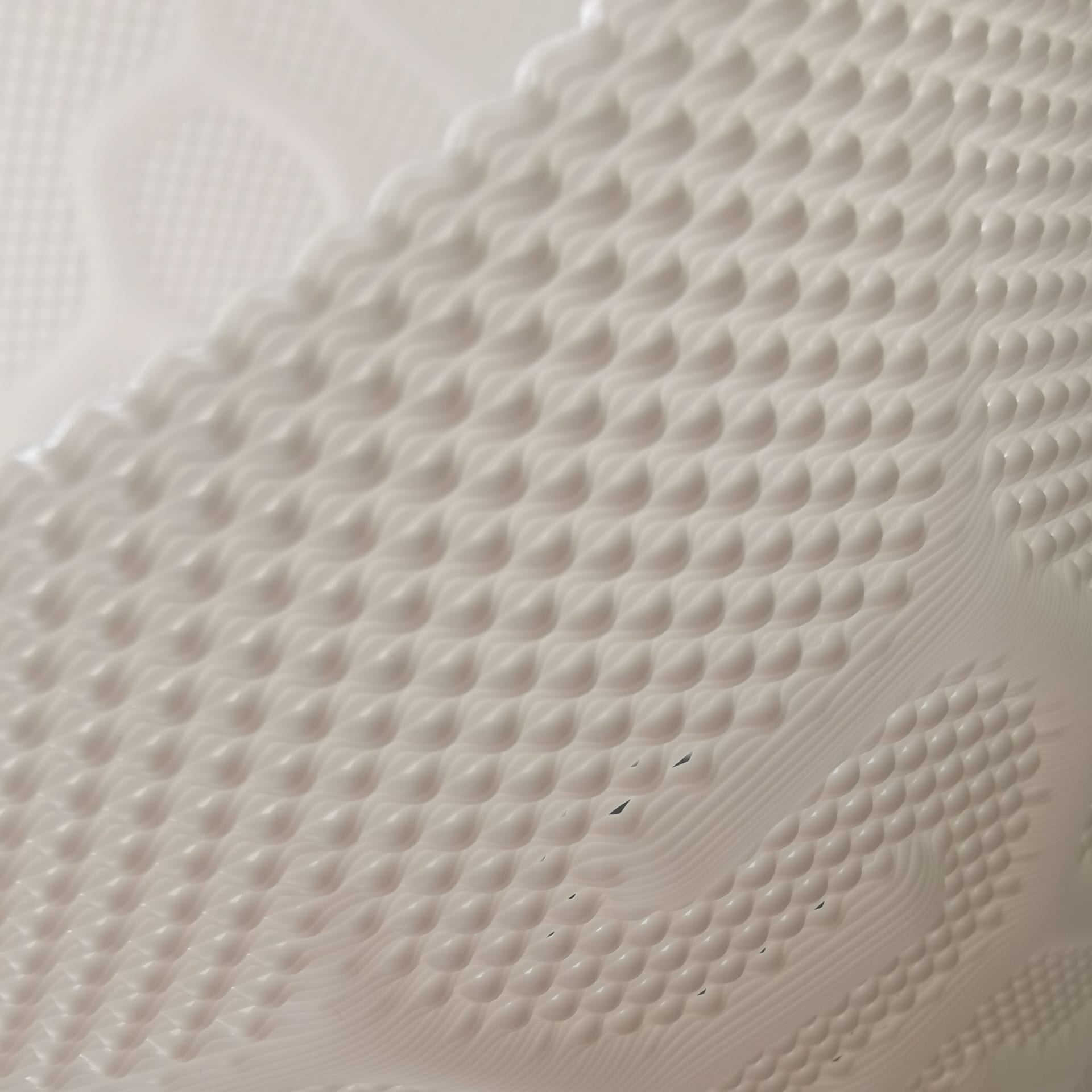 Close-up of the 3D-printed surface of a LampDesign piece, showcasing its refined layered texture and soft matte finish. Each lamp is printed with precision and hand-finished to create a warm, sculptural presence in any interior.