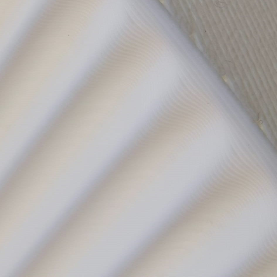 Close-up of beige fabric texture