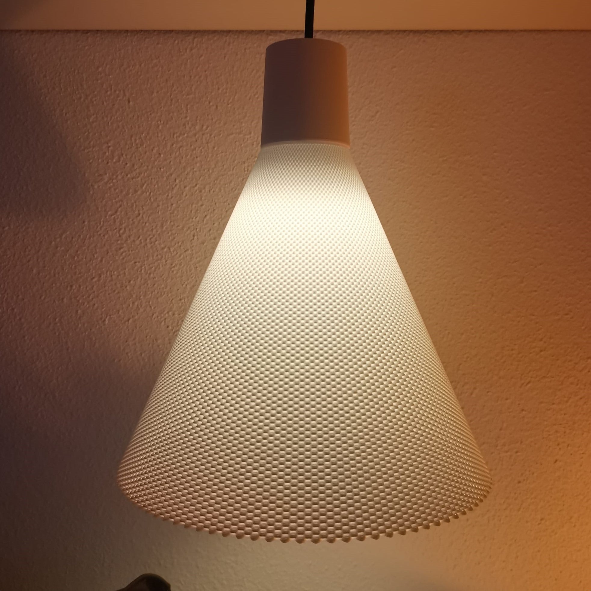 Textured lampshade on a neutral background