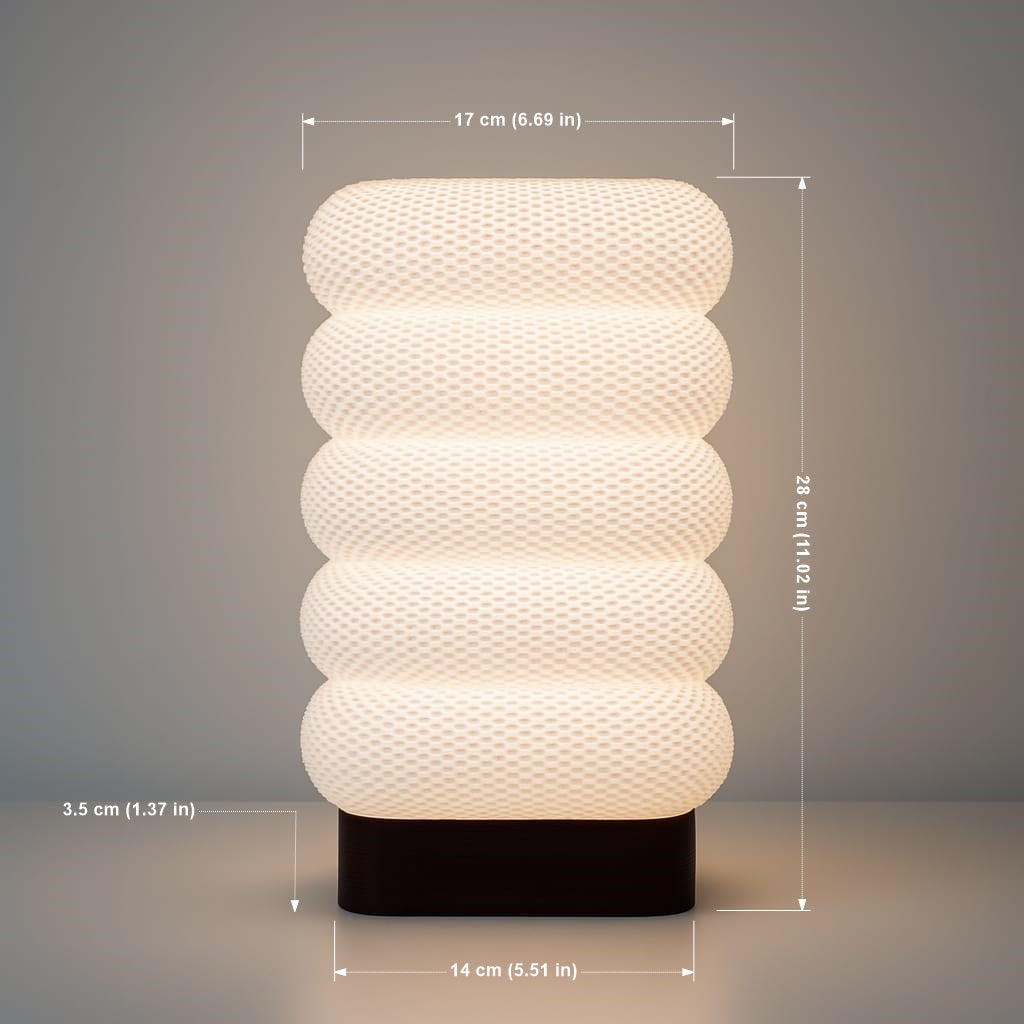 White textured table lamp with dimensions on a gray background