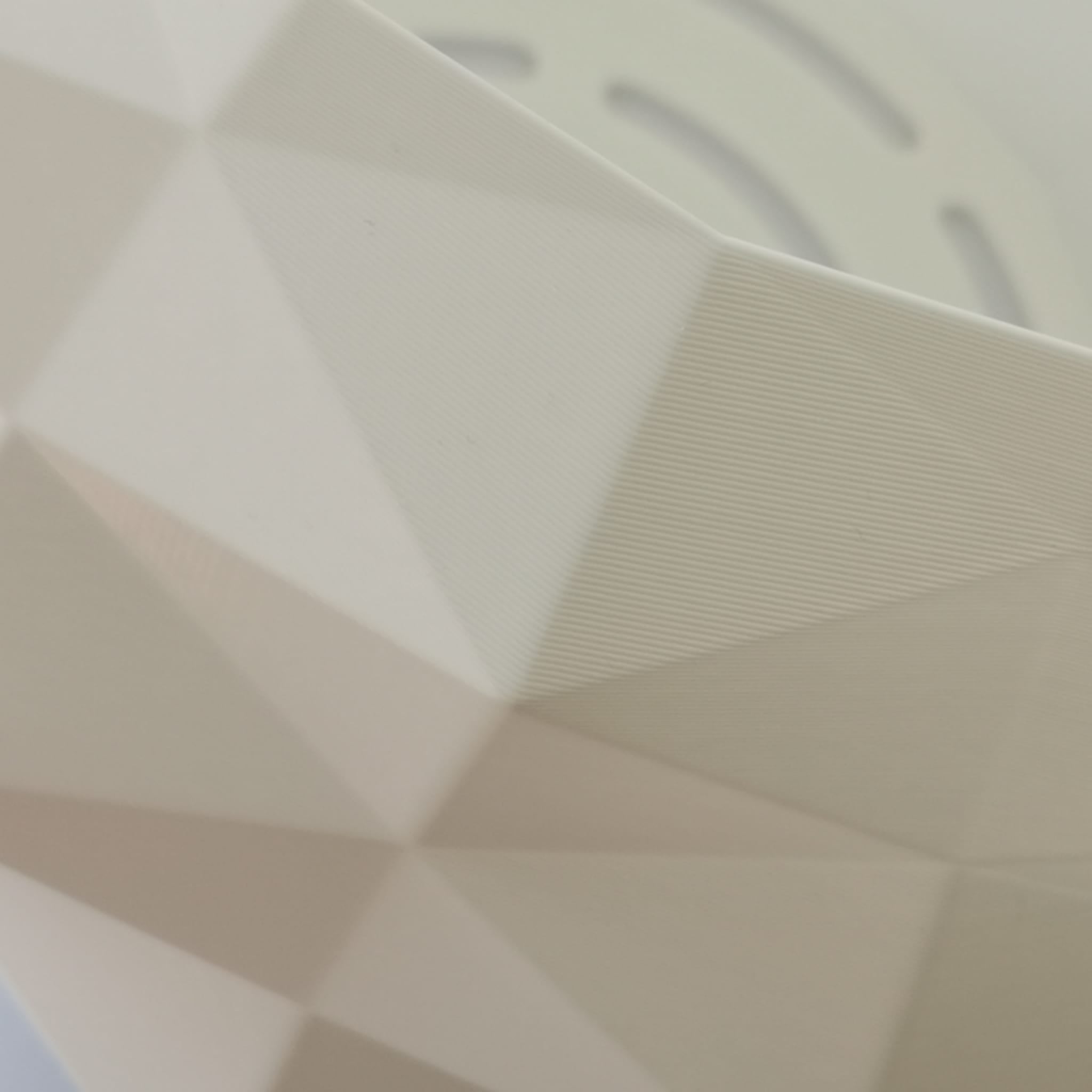 Close-up of a textured white pendant lamp