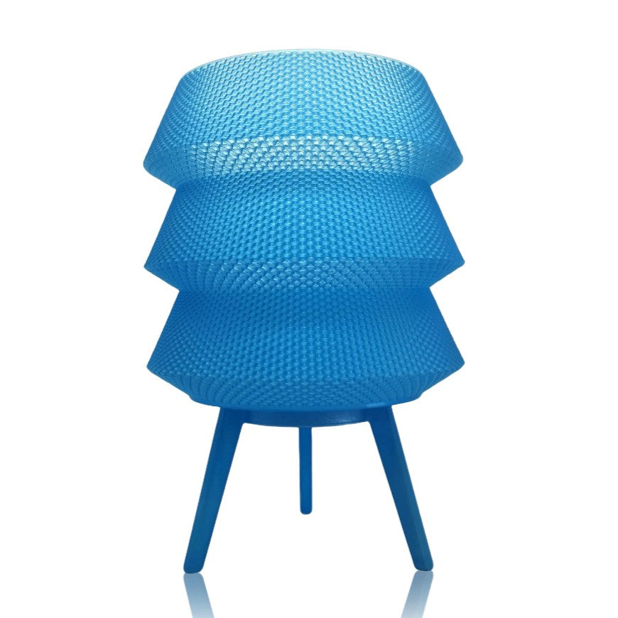 Blue textured table lamp on a white background