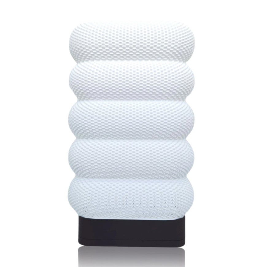 White textured table lamp on a white background
