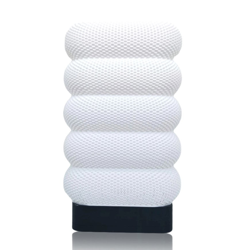 White textured table lamp on a white background