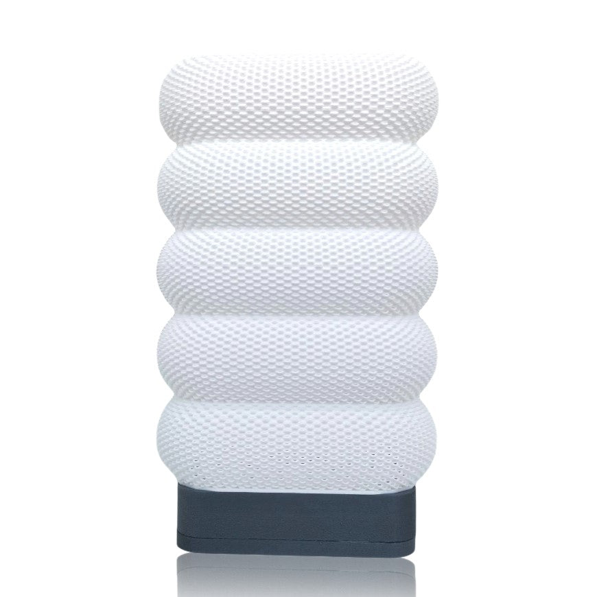White textured table lamp on a white background