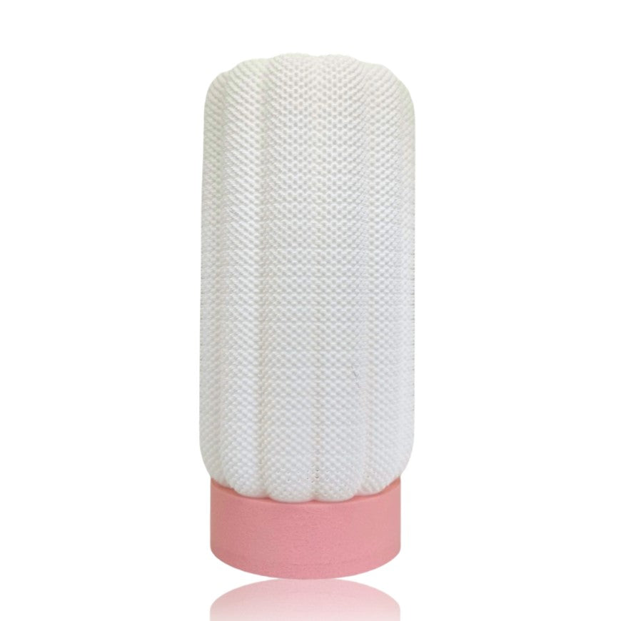 White textured table lamp with a pink base on a white background