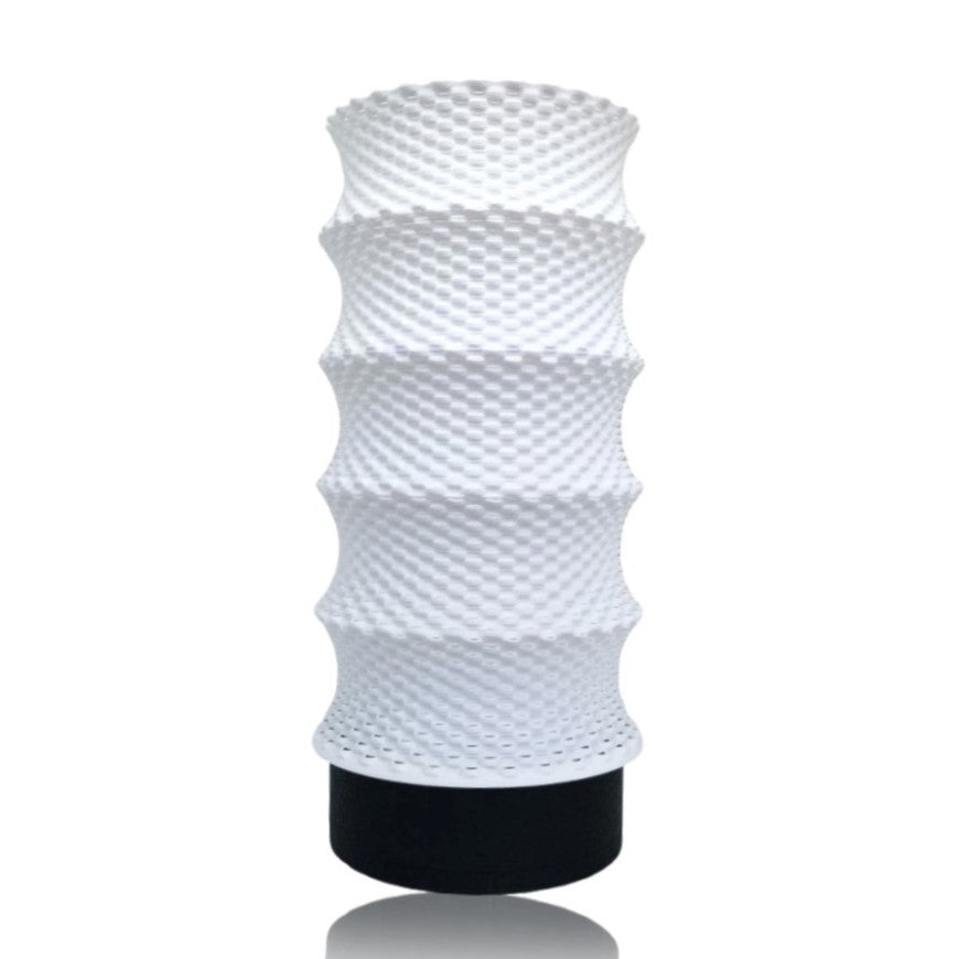 White textured table lamp on a white background