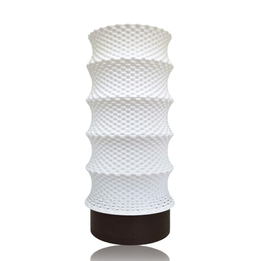 White textured table lamp on a white background