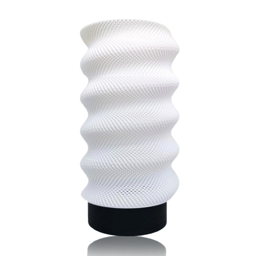 White textured table lamp on a white background