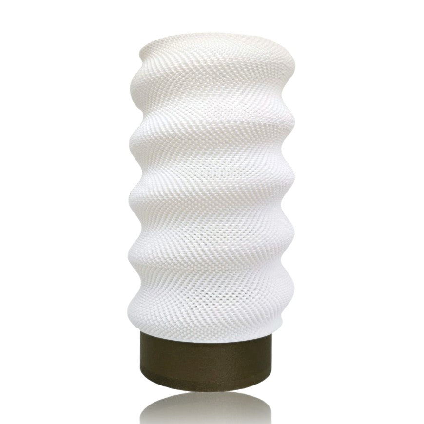 White textured table lamp on a white background