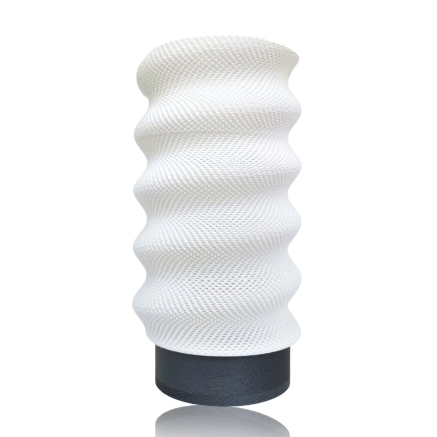 White textured table lamp on a white background