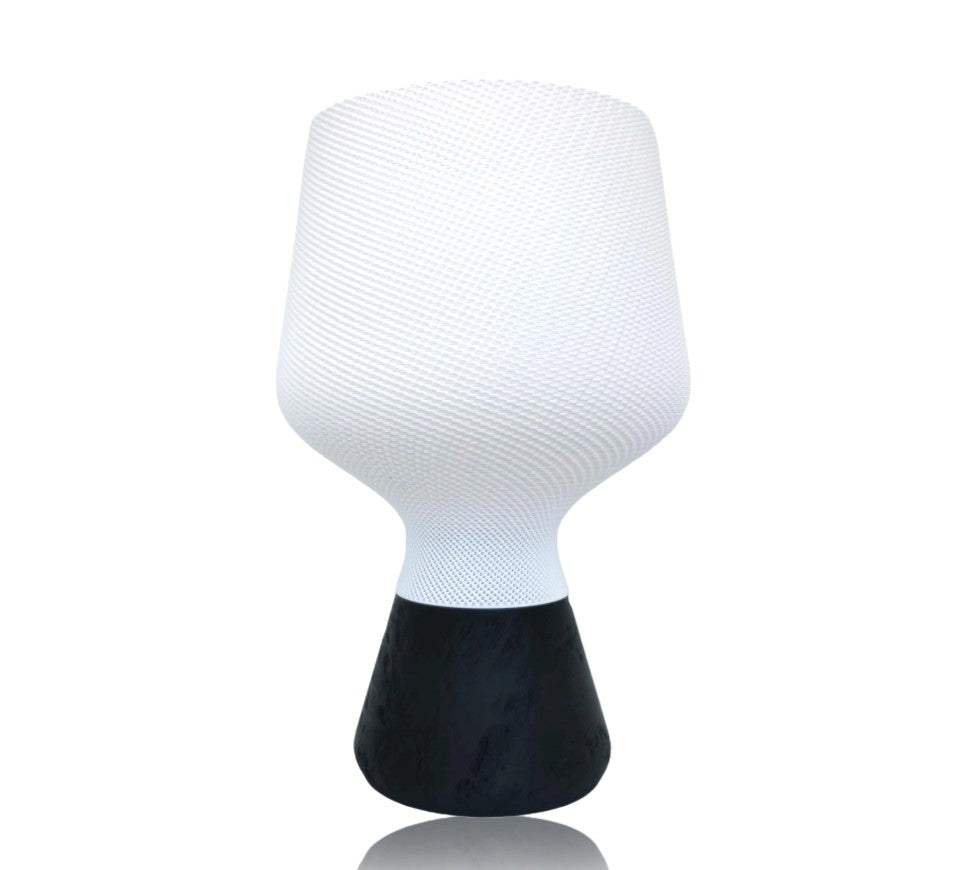 White textured lampshade on a black base against a white background