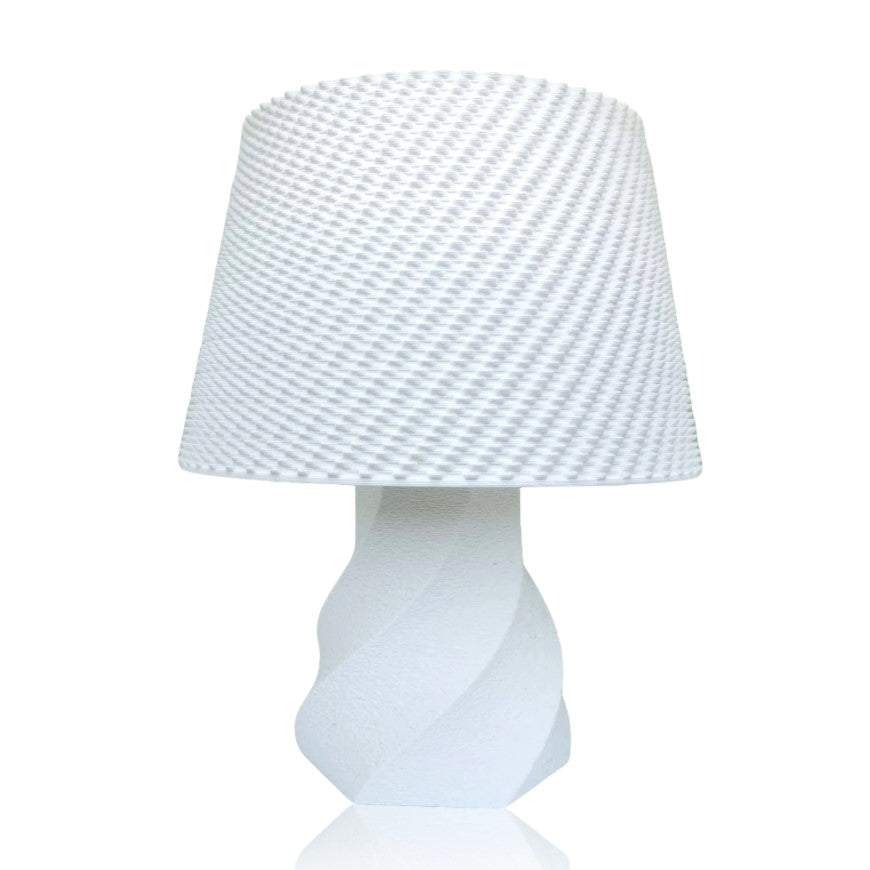 White textured lamp with a patterned shade on a white background