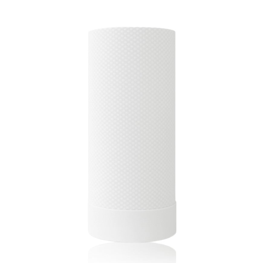 White cylindrical table lamp on a white background