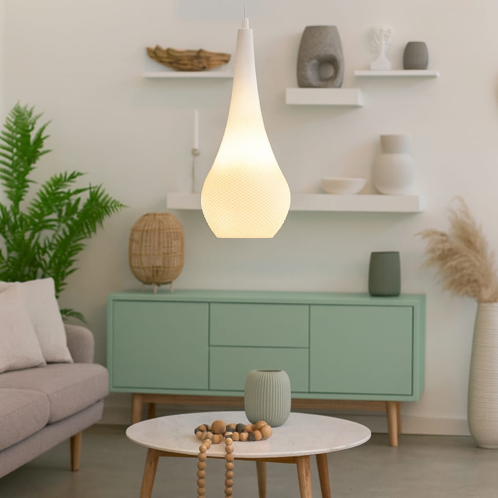 Living room with a green cabinet, white table, and decorative items.