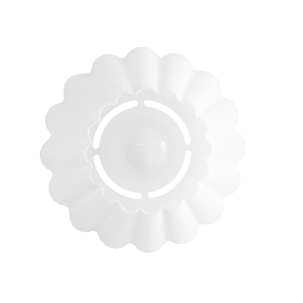 White flower-shaped wall lamp with a central circular cutout on a white background