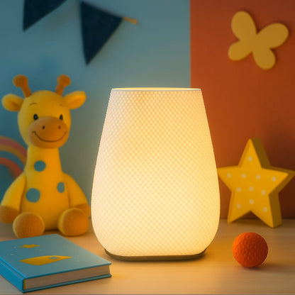 Nursery night light lamp with soft warm glow on kids’ bedside table, surrounded by toys and decor, perfect children’s room lighting.