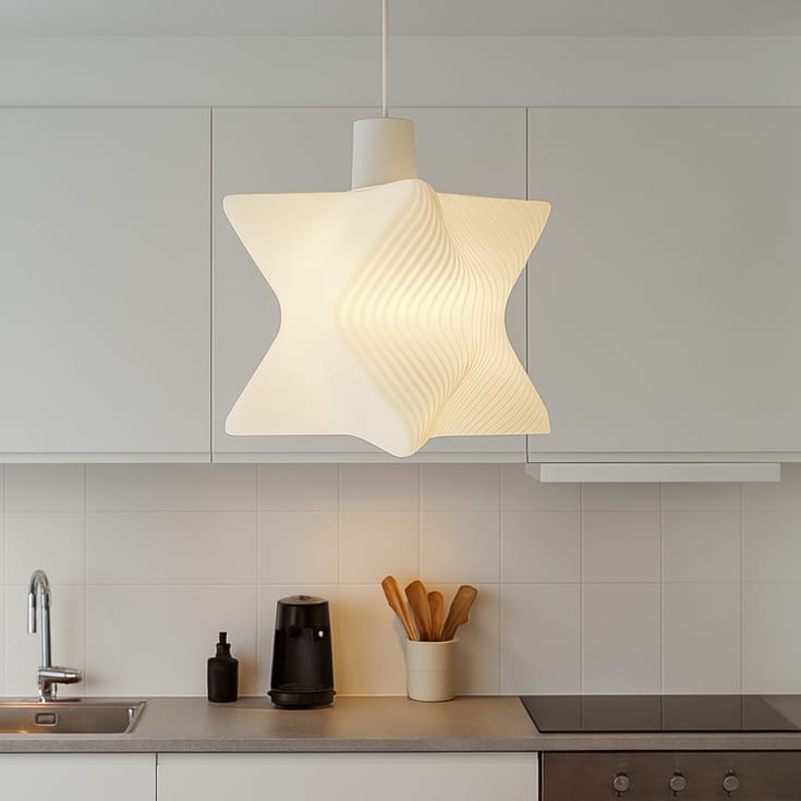 Modern kitchen with a unique pendant light fixture.