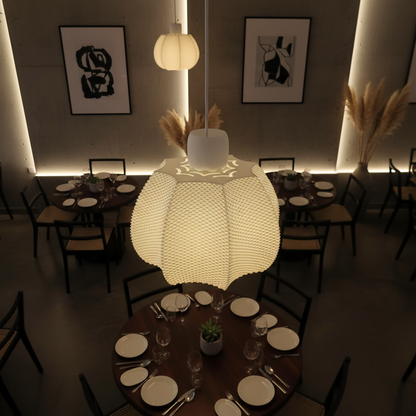 Softly illuminated woven pendant light hanging above a round dining table set for dinner in a modern restaurant interior.