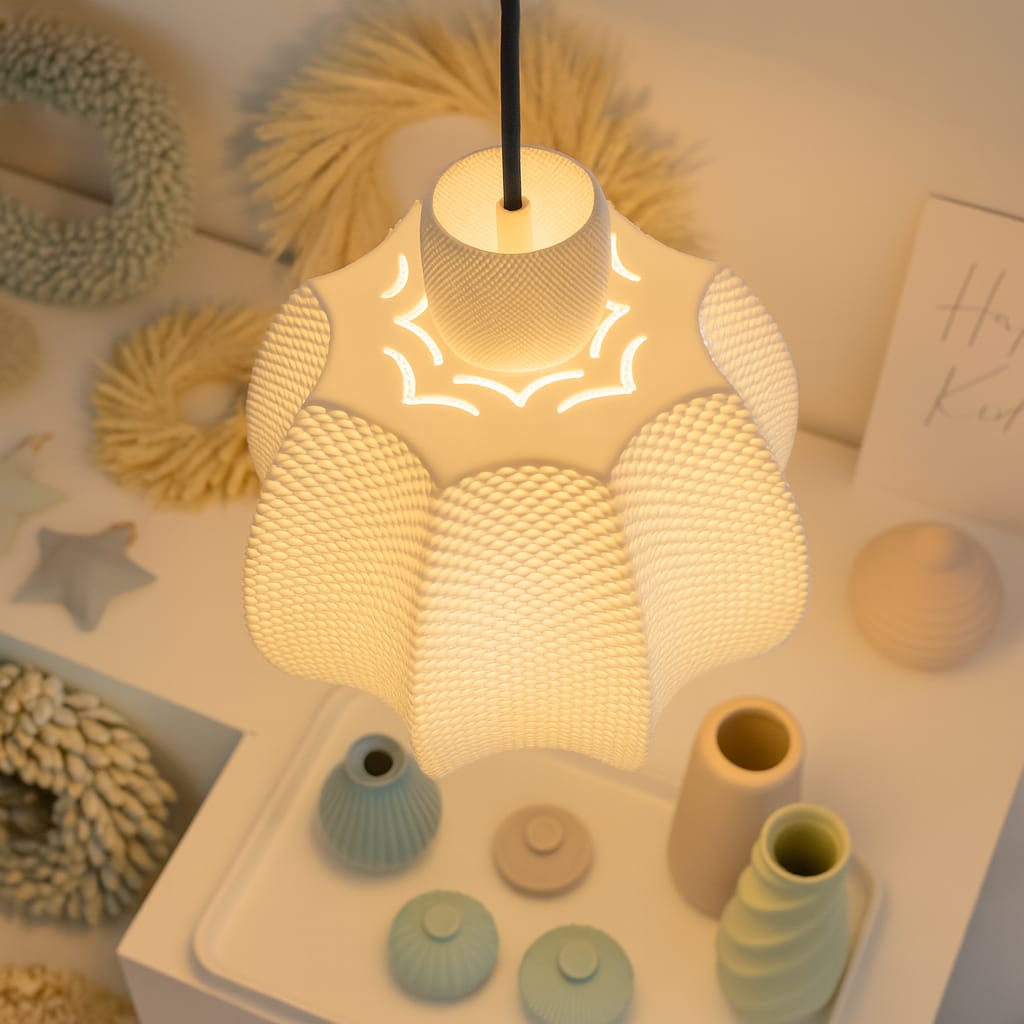Decorative lamp with textured design on a shelf with decorative items