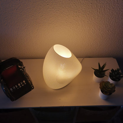 Contemporary decorative lamp illuminating a minimalist interior