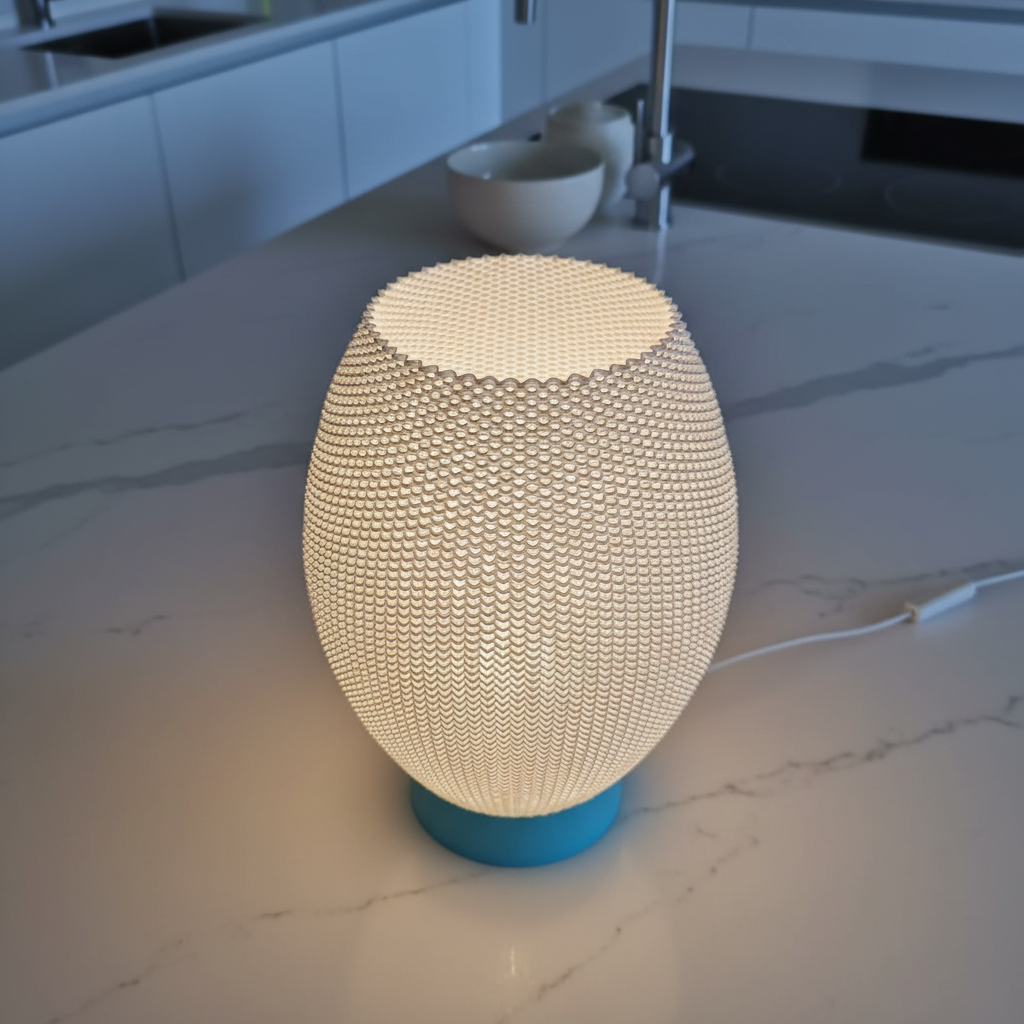 Decorative lamp with textured design on a marble surface in a kitchen setting