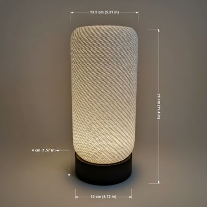 Textured cylindrical lamp with dimensions indicated on a dark background
