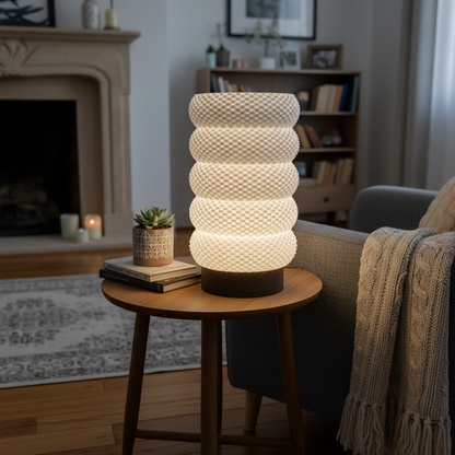Decorative lamp on a side table in a cozy living room setting.