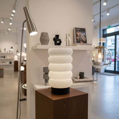 Modern interior with a textured table lamp on a wooden pedestal