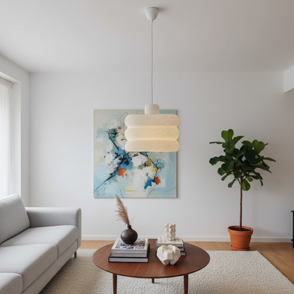 Decorative pendant light with textured shade adding warmth to a neutral interior