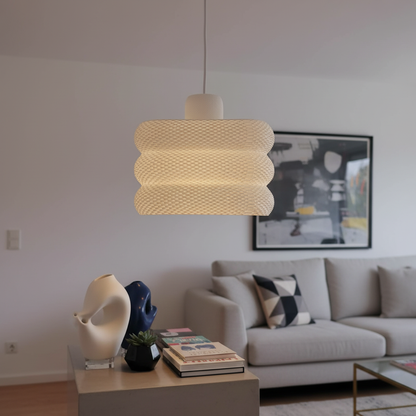 Minimalist woven pendant light creating warm ambient lighting in a contemporary interior
