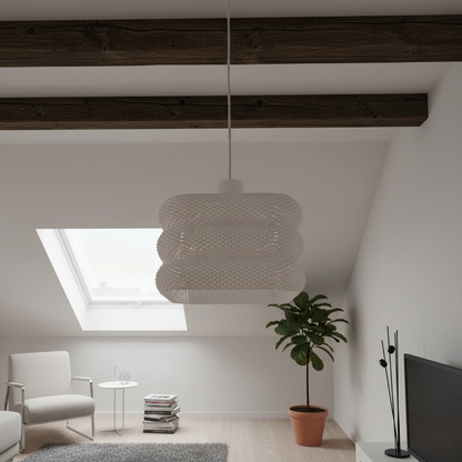 Textured pendant lamp with a layered shade hanging in a minimalist attic living space