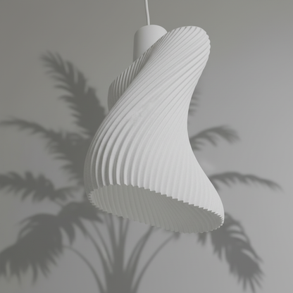 White textured pendant light against a gray wall with plant shadows
