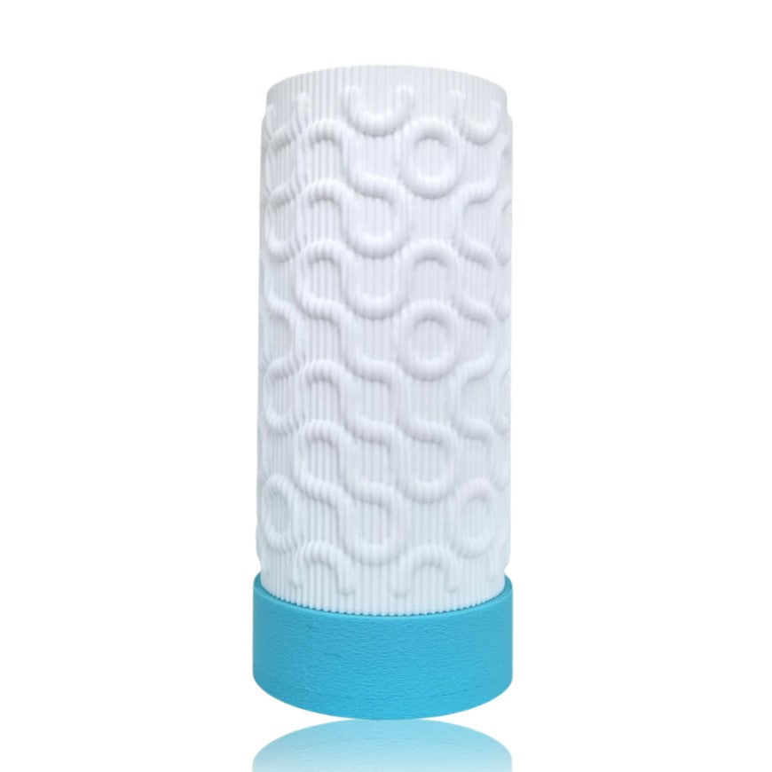 Cylindrical table lamp with textured design and blue base on a white background