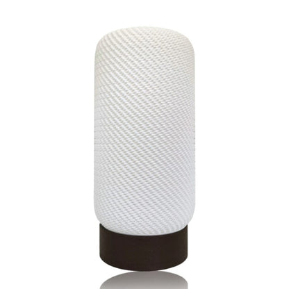 White textured lamp with brown base on a white background