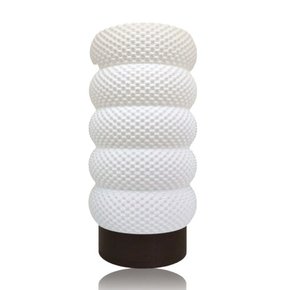 White textured table lamp on a white background