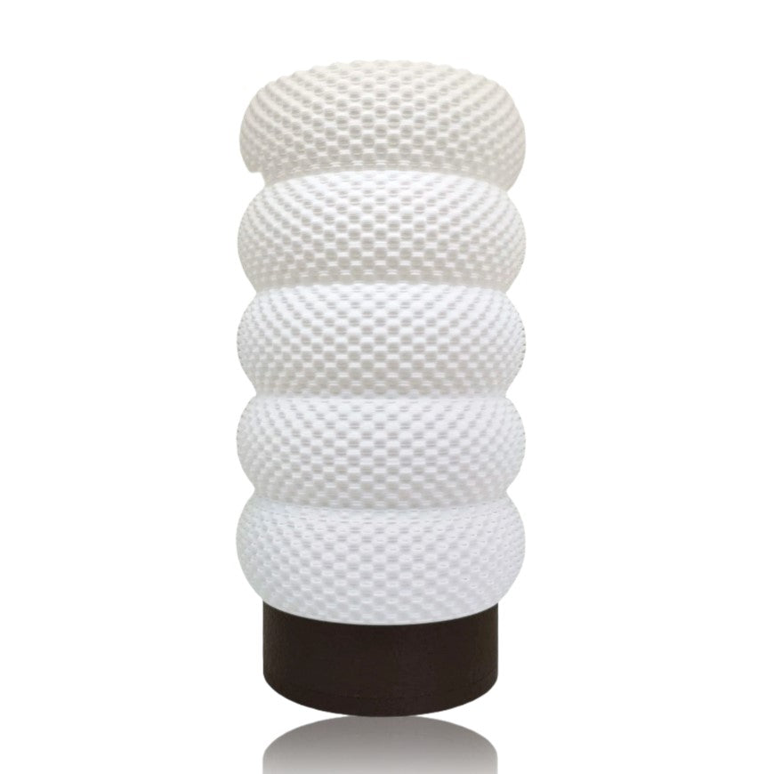 White textured table lamp on a white background