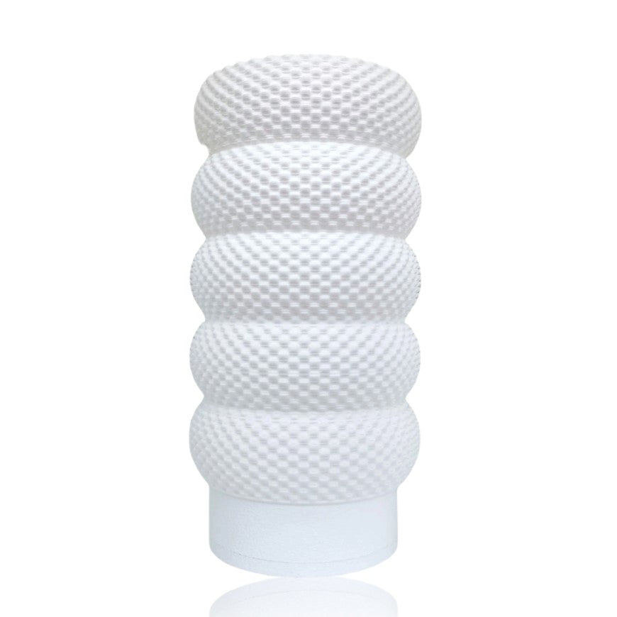 White textured table lamp on a white background