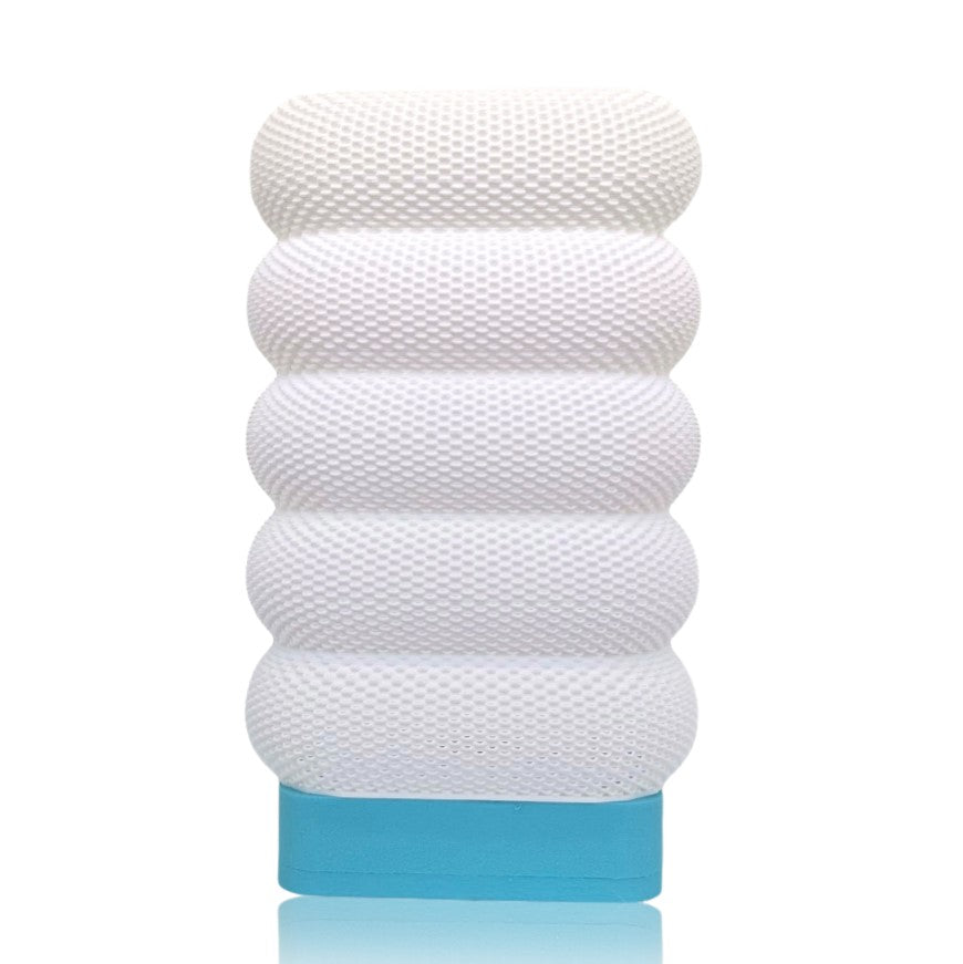 White textured cylindrical table lamp with a blue base on a white background