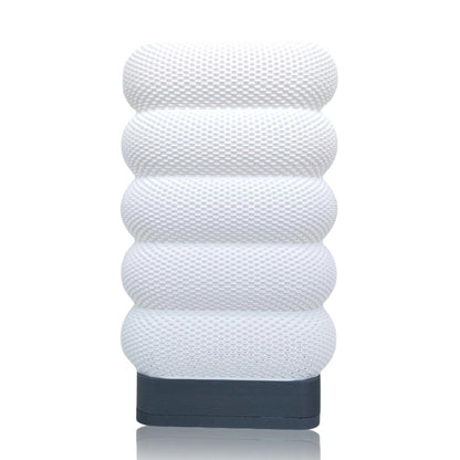 White textured table lamp on a white background