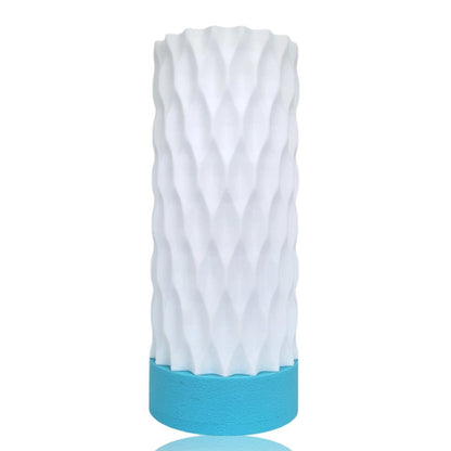 White textured table lamp with a blue base on a white background