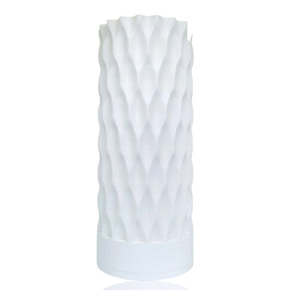 White table lamp with a textured pattern on a white background