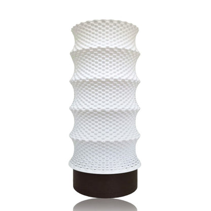 White textured table lamp on a white background