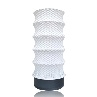 White textured cylindrical table lamp on a white background
