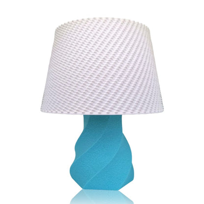Turquoise lamp with a white textured shade on a white background
