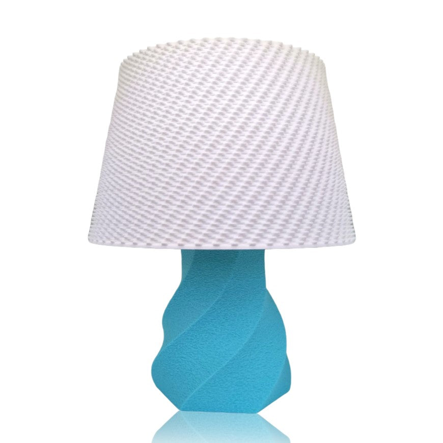 Turquoise lamp with a white textured shade on a white background