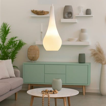 Living room with a green cabinet, white table, and decorative items.