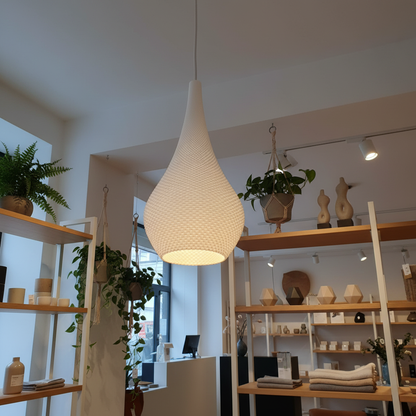 Minimalist white hanging lamp with a tapered top and rounded base, featuring a 3D honeycomb-like texture.